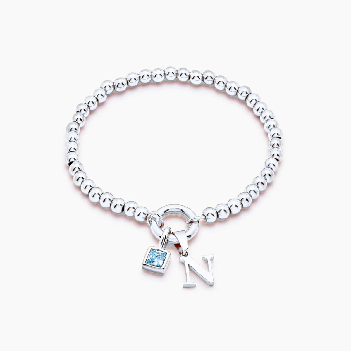 beaded-initial-birthstone-bracelet — Silver / Dec-Blue Topaz