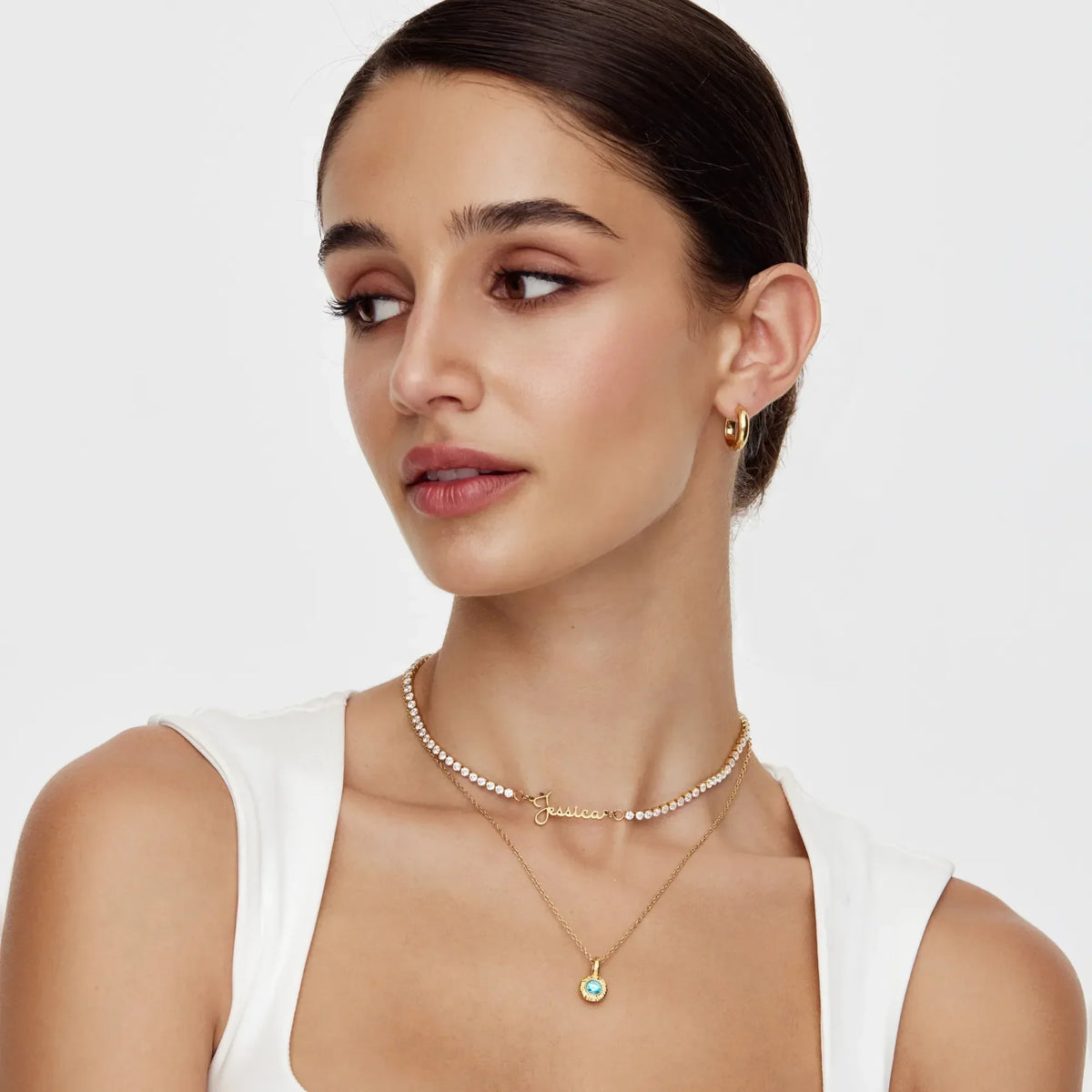 Gold personalised tennis necklace flat lay — Olivia Jewelry
