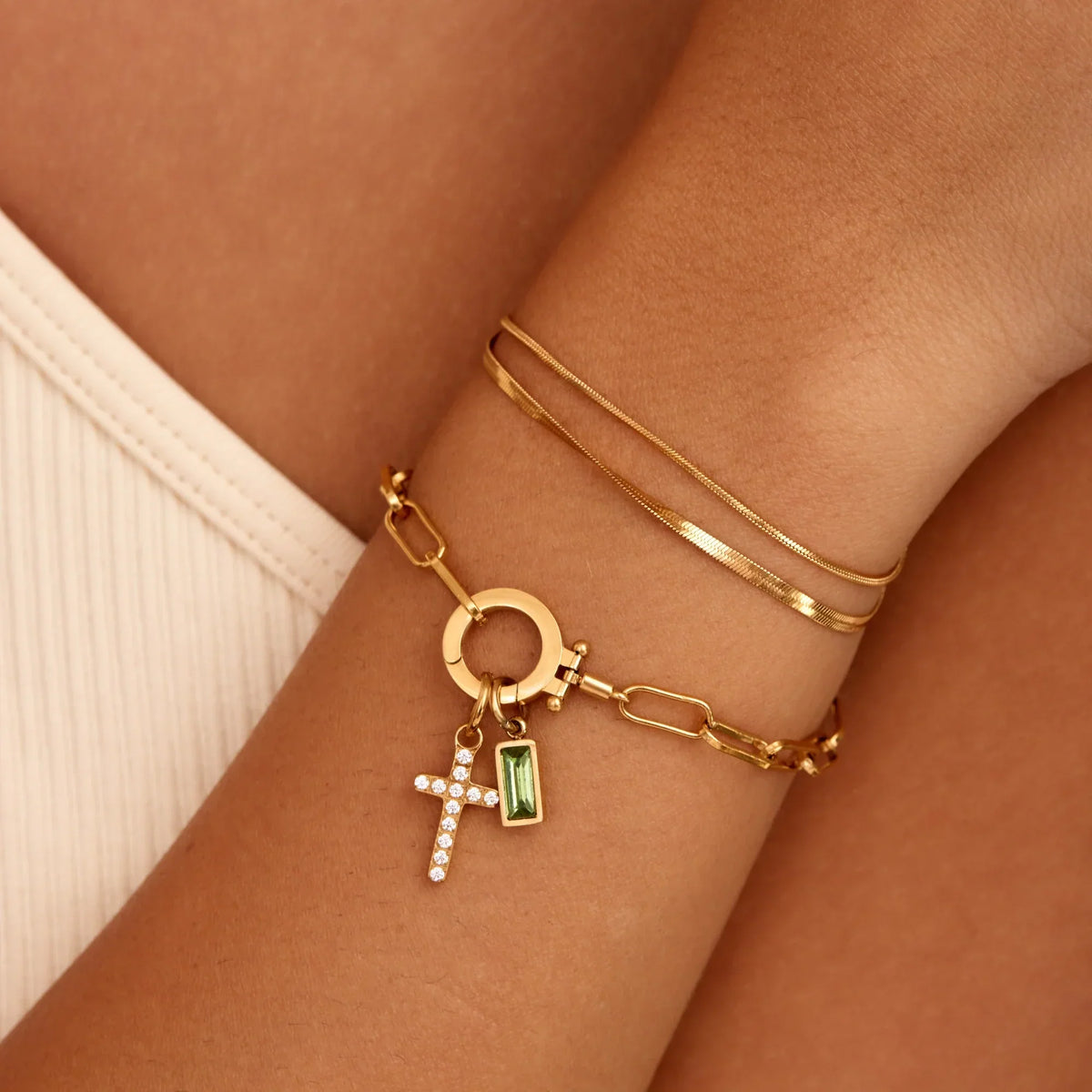 Paperclip birthstone bracelet flat lay — Olivia Jewelry