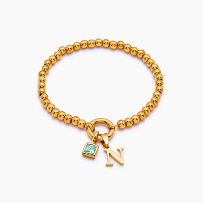 beaded-initial-birthstone-bracelet — Gold / May-Emerald