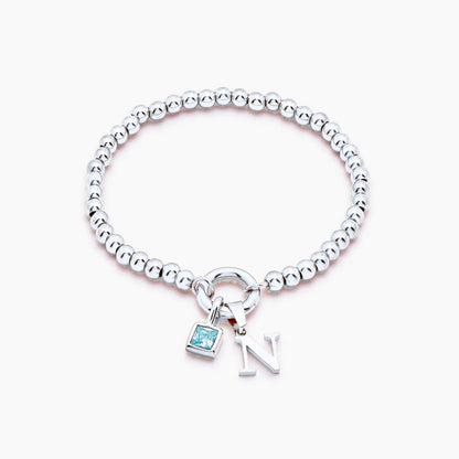 beaded-initial-birthstone-bracelet — Silver / Mar-Aquamarine